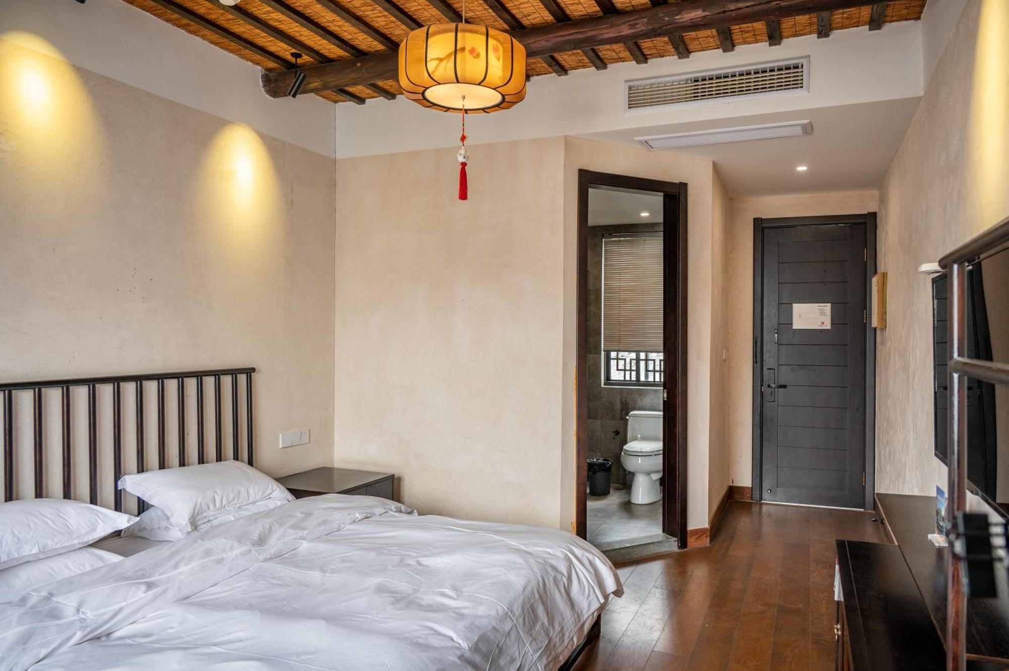 Tongxiang Tingjian Musu Private Soup Design Homestay - South Gate Of Wuzhen Xizha Scenic Area מראה חיצוני תמונה